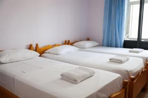 Postel nebo postele na pokoji v ubytování Haka Guesthouse