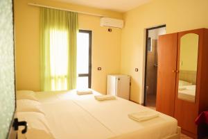 Postel nebo postele na pokoji v ubytování Haka Guesthouse