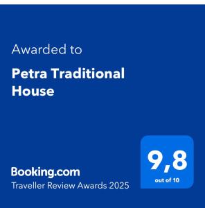 a screenshot of a cell phone with the text awarded to pta traditional house at Petra Traditional House in Episkopión