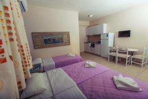 Katil atau katil-katil dalam bilik di Sunshine Resort