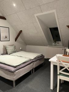 Varde Bed and Kitchen客房内的一张或多张床位