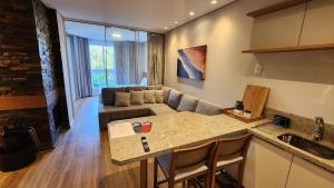 Η κουζίνα ή μικρή κουζίνα στο Aconchegante Flat Serra Class