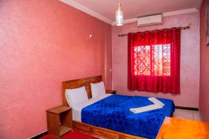 Postel nebo postele na pokoji v ubytování Appartement Afgo Ouarzazate