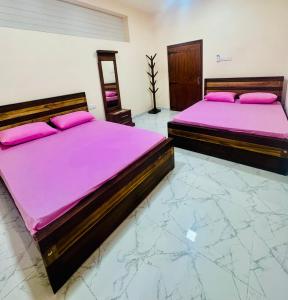 Ένα ή περισσότερα κρεβάτια σε δωμάτιο στο Madinah Comfort Inn