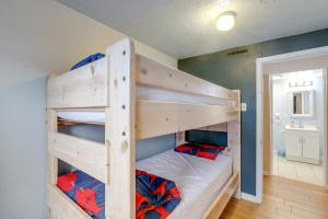 a bedroom with two bunk beds in a room at Less Than half Mi to Beach Wildwood Getaway with Patio! in Wildwood