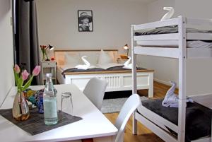 Postel nebo postele na pokoji v ubytování Gästehaus Lorz