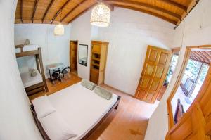 Postel nebo postele na pokoji v ubytování Pradera Ecoliving