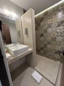 Vannituba majutusasutuses Hotel Mariel Holbox