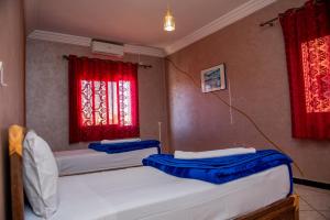 Postel nebo postele na pokoji v ubytování Appartement Afgo Ouarzazate
