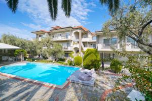 an image of a villa with a swimming pool at Luxury Villa Fotini in Limenas