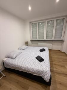Postel nebo postele na pokoji v ubytování Chambre Centre Esch-sur-alzette