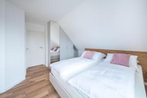 Postel nebo postele na pokoji v ubytování Hotel Magnolie GmbH