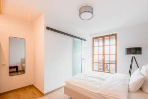 Postel nebo postele na pokoji v ubytování Hotel Magnolie GmbH