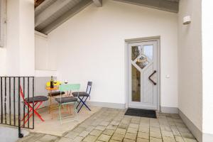 En terrasse eller udendørsområde på Ferienwohnung B2