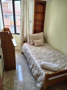 Ένα ή περισσότερα κρεβάτια σε δωμάτιο στο Balcones del Chicamocha