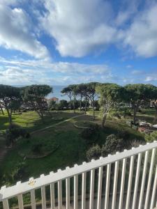 a view of a park from a balcony at La Casina di Cice in Follonica