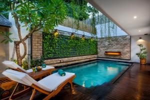 Bazén v ubytování Astagina Resort Villa and Spa nebo v jeho okolí