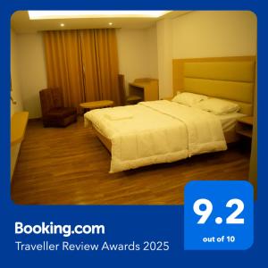 a hotel room with a bed in a room at The Grand ARK in Gangtok