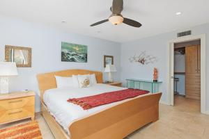a bedroom with a bed and a ceiling fan at Sea Forever - DMST3536 in Solana Beach +42 photos
