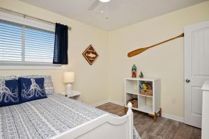 En eller flere senge i et værelse på Beach Retreat + 72 billeder