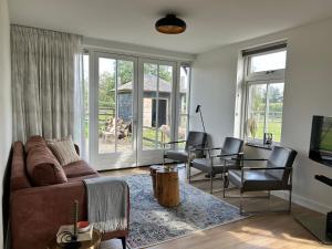 Posezení v ubytování Geldersche tuin 6 persoons