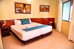 Postel nebo postele na pokoji v ubytování Hotel Monchuelo Spa
