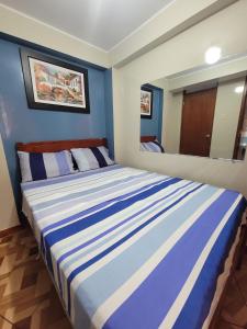 Postel nebo postele na pokoji v ubytování Hospedaje Escorpio