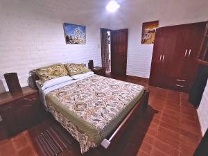 Ένα ή περισσότερα κρεβάτια σε δωμάτιο στο Cabañas Valle San Miguel +173 φωτογραφίες