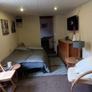 Telewizja i/lub zestaw kina domowego w obiekcie 5 Minutes from the Beach