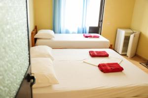 Postel nebo postele na pokoji v ubytování Haka Guesthouse