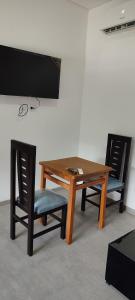 TV a/nebo společenská místnost v ubytování Departamento101