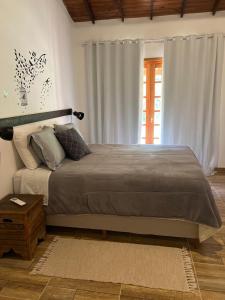 Katil atau katil-katil dalam bilik di Casa Bem Te Vi +27 gambar