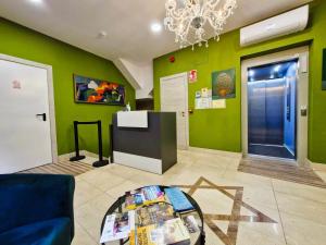 TV a/nebo společenská místnost v ubytování Feeling Home - Suites&Rooms