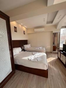 Ένα ή περισσότερα κρεβάτια σε δωμάτιο στο Queen Cleopatra Boutique Hotel +68 φωτογραφίες