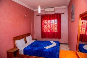 Postel nebo postele na pokoji v ubytování Appartement Afgo Ouarzazate