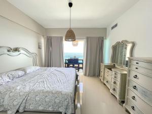 Postel nebo postele na pokoji v ubytování Acogedor Apartamento con Vista al mar + 16 fotografií