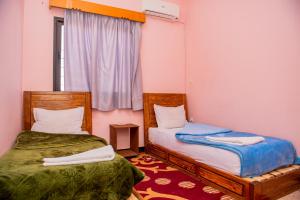 Postel nebo postele na pokoji v ubytování Appartement Afgo Ouarzazate