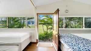 Giường trong phòng chung tại Tullenderly