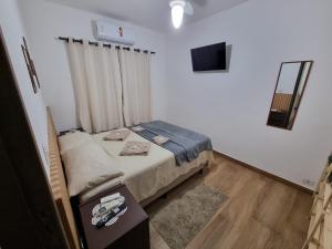 Ένα ή περισσότερα κρεβάτια σε δωμάτιο στο Studio Ideal