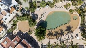 an overhead view of a pool at a resort at Casa Nima by Lumina in San José del Cabo +32 photos
