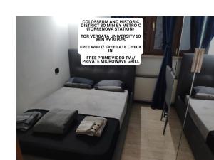 A bed or beds in a room at Mini Deluxe Room - Close to Metro C