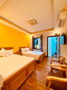 Postel nebo postele na pokoji v ubytování Đảo Bình Ba, nhà nghỉ sắc màu đi bộ ra biển rất gần, không nhận khách quốc tế, phòng đôi - nhận cọc trước mới giữ phòng