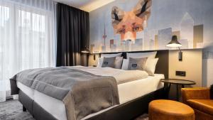 Cama ou camas em um quarto em Holiday Inn - the niu, Charly Frankfurt City by IHG