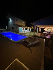 Swimmingpoolen hos eller tæt på Recanto Sonho Meu