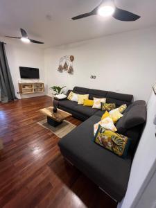 Χώρος καθιστικού στο Villa O'Mangos hibiscus