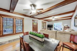 a living room with a table and a couch at Bay's Place Vacation Rental in Lake Geneva