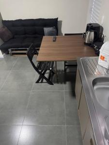 Flats & Residences - Apart Moderno com Conforto的厨房或小厨房