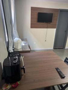 Flats & Residences - Apart Moderno com Conforto的电视和/或娱乐中心