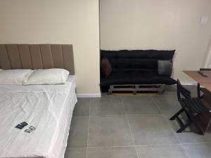 Flats & Residences - Apart Moderno com Conforto客房内的一张或多张床位