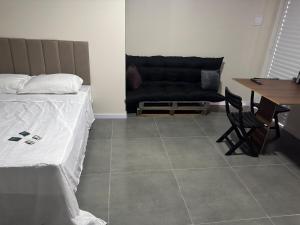 Flats & Residences - Apart Moderno com Conforto客房内的一张或多张床位